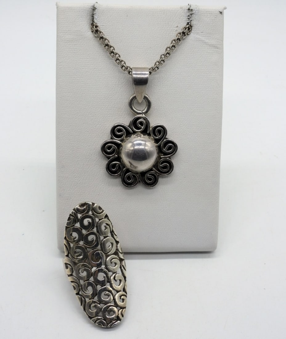 Taxco 925 Necklace & Fashion Ring: Taxco sterling pendant, 1.5" on a 20" sterling chain. Sterling fashion ring, size 8. (18 dwt)