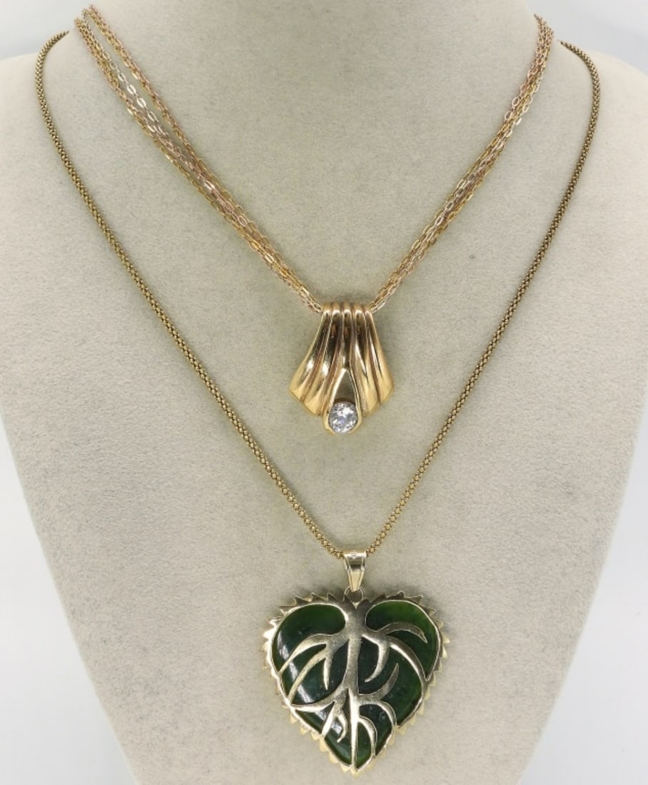 2 Gold Tone Sterling Necklaces - Jade: Gold tone sterling necklaces. Leaf necklace has Jade gemstone, Multi strand necklace has simulated diamond. (17.2 dwt)