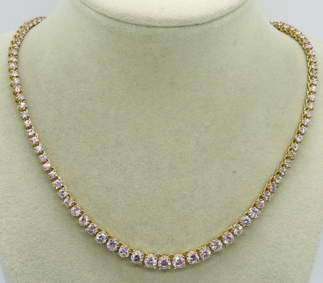 Sterling Gold Tone Pink CZ Necklace: Sterling gold tone necklace, 18" long. With pink cz gemstones. (19 dwt)
