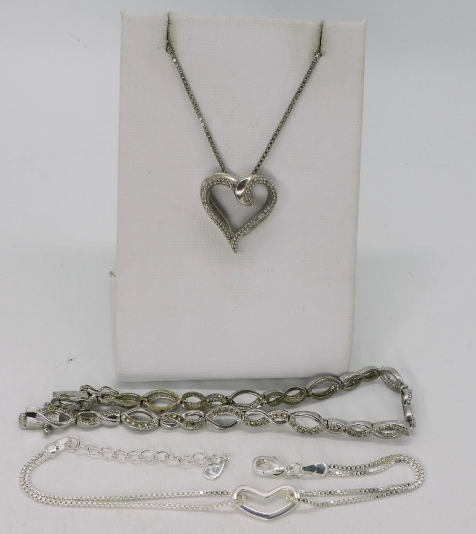 Moissanite Heart 925 Necklace & Bracelets: One sterling heart necklace with moissanite gemstones (tested), 18" long. Two sterling bracelets, 7.5". (11.4 dwt)