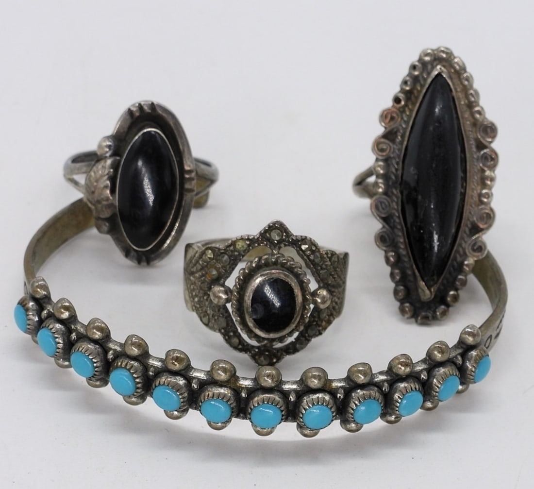 Turquoise & Black Onyx Sterling Rings: Three sterling rings with black onyx, sizes 5.5-8. Sterling turquoise cuff bracelet. (14.5 dwt)