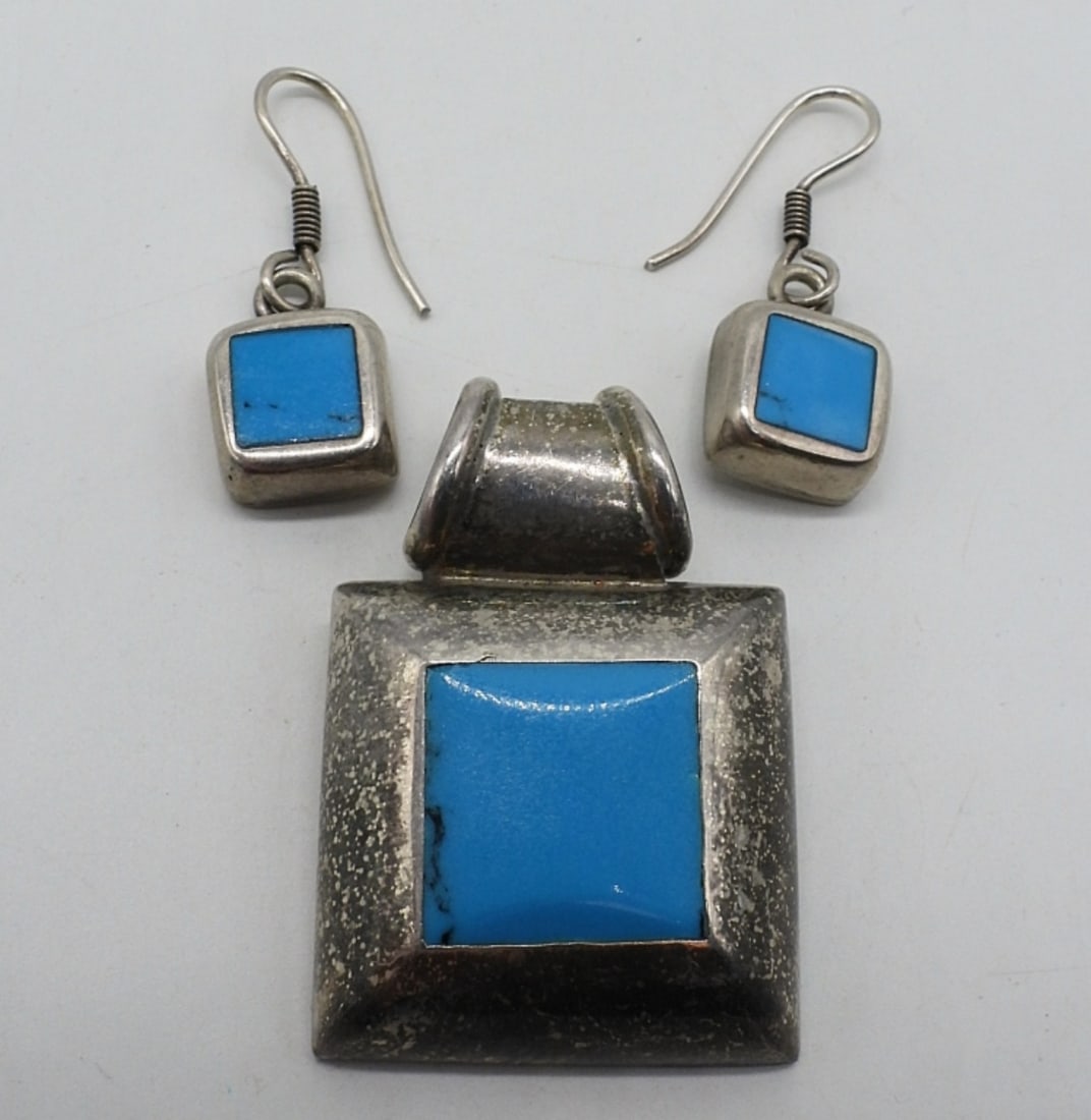 Taxco Turquoise Slider Pendant & Earrings: Taxco Mexico sterling turquoise slider pendant, 2" long. Taxco stamp is faded and hard to read, see photos. Sterling turquoise pierced earrings, 1.5" long. (17 dwt)