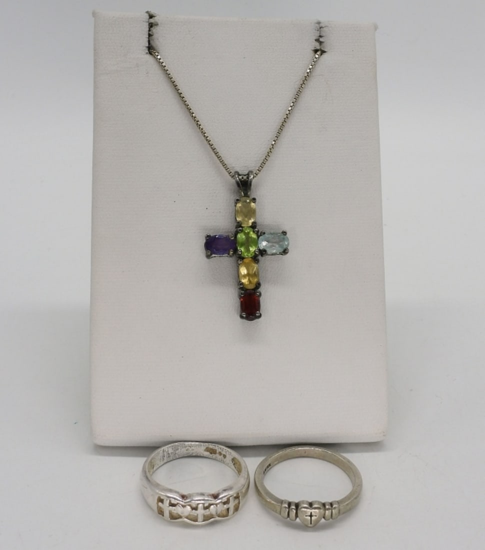 Religious 925 Cross Necklace & Rings: Two sterling religious cross rings, size 7. Multi gemstone cross pendant (1 1/4") on a 18" long sterling chain. (6 dwt)