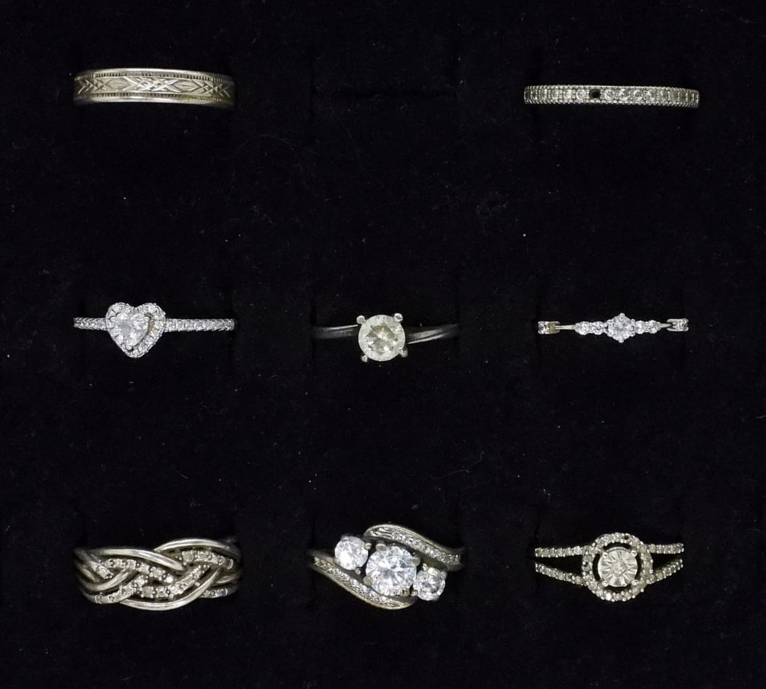 8 Sterling Bridal Style Fashion Rings: Eight sterling bridal style fashion rings, simulated diamonds. Sizes 6.5 - 9. (11 dwt)