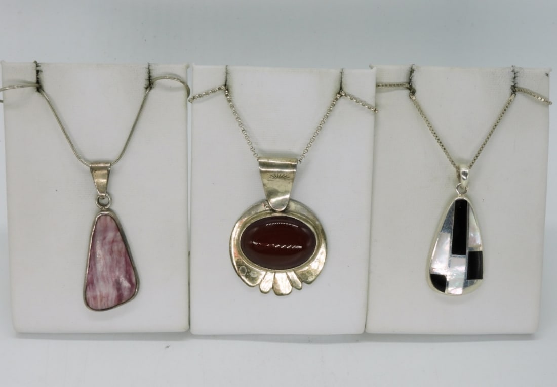3 Sterling Gemstone Pendant Necklaces: Three sterling gemstone necklaces, 18" long. (20 dwt)