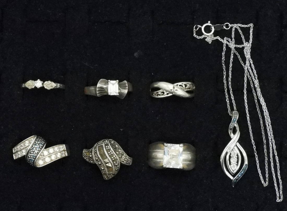 Simulated Diamond & Marcasite 925 Rings: Six sterling rings with simulated diamonds and marcasite (one ring is missing several center marcasite stones). Sizes 6.5-11. One sterling necklace, 18". (21 dwt)