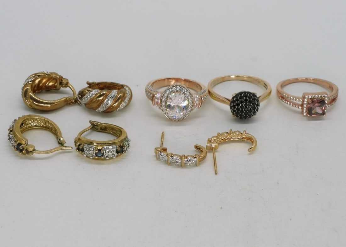 Gold Tone Sterling Rings & Earrings: Three sterling gold tone rings, sizes 7, 8, 10. Three pair of sterling gold tone pierced earrings. (14 dwt)