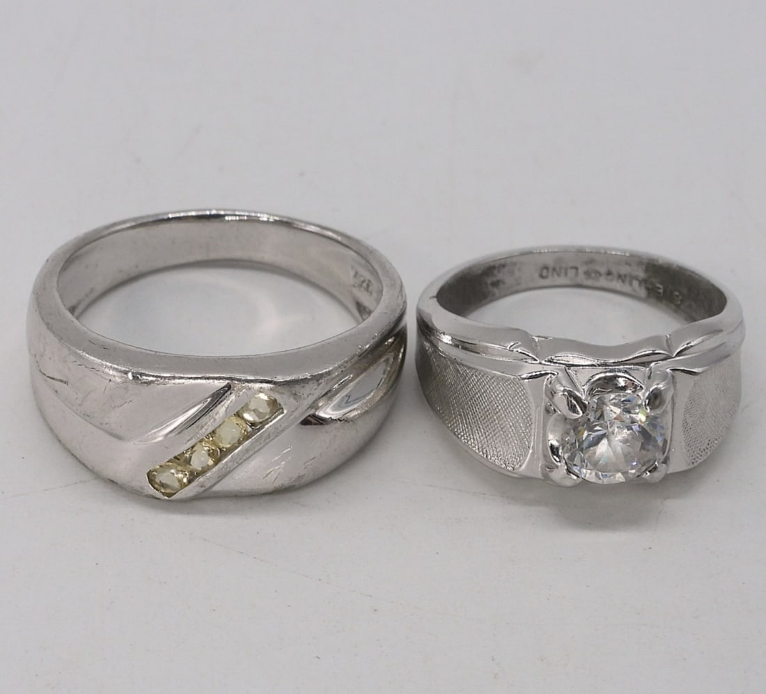 Two Sterling Mens Fashion Rings: Two sterling mens fashion rings, size 9 & 11.5 (9.3 dwt)