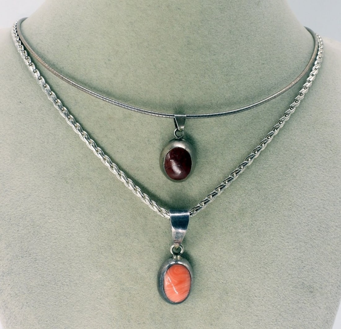 Taxco Mexico 925 Necklaces: Two sterling necklaces, one is Taxco and one is Mexico. Chains are 16" & 24". (18 dwt)