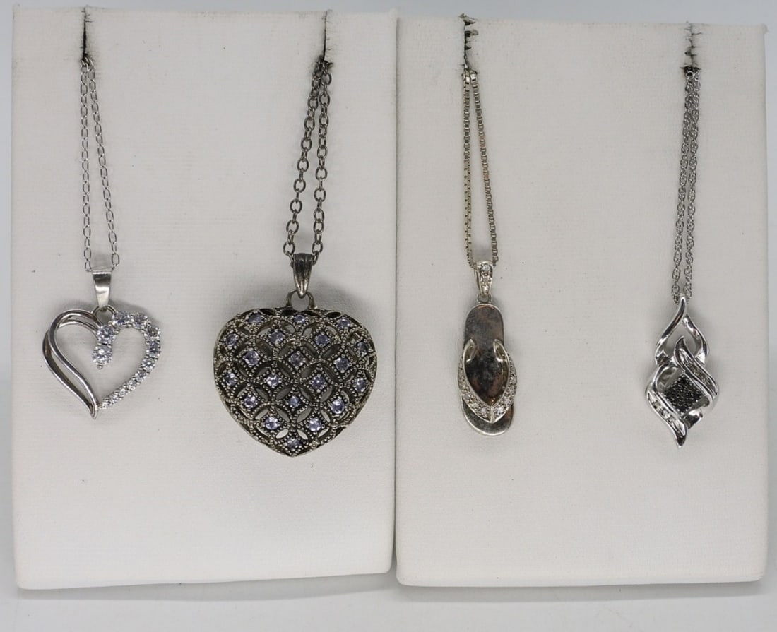 Four 925 Necklaces, Hearts & Sandals: Four sterling necklaces, 16" & 18" long. (10.9 dwt)
