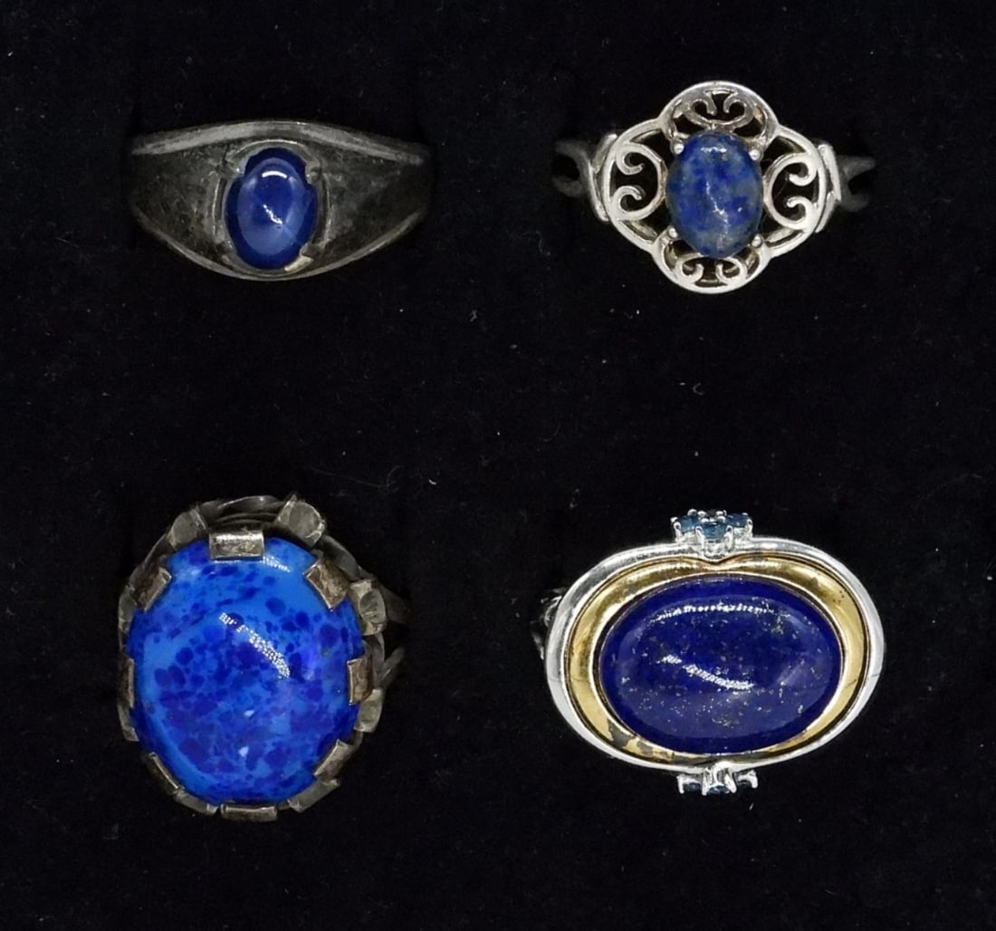 Four Lapis & Cats Eye Sterling Rings: Four sterling, lapis lazuli and blue cats eye gemstone rings, size 8 & 9. (12 dwt)