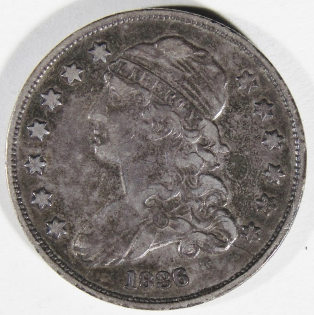 1836 Bust Quarter: Bid with Vintage Auctions!