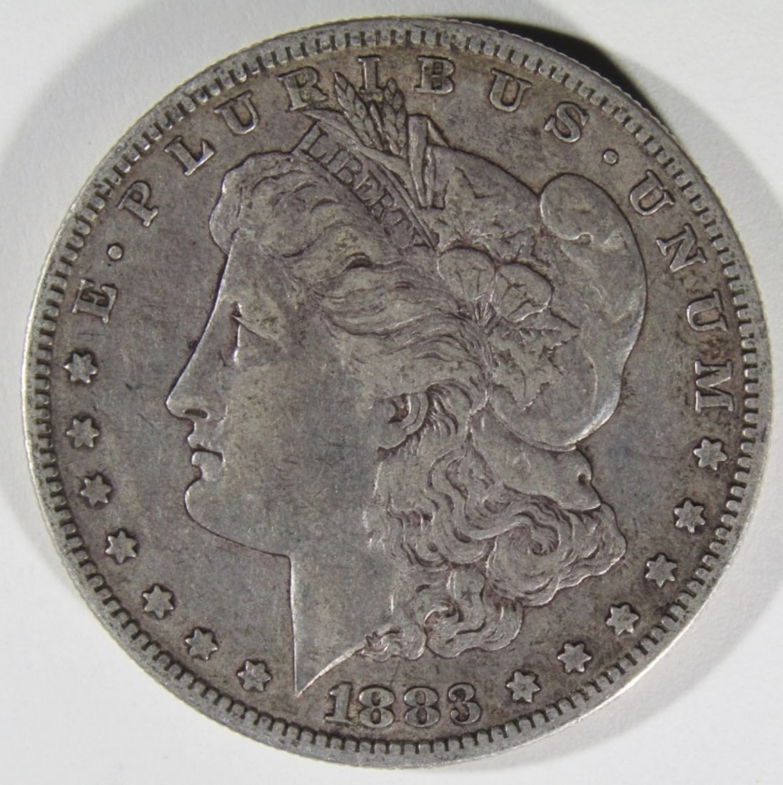 1883-S Morgan Dollar: Follow us on Facebook, Instagram, X, and TikTok.