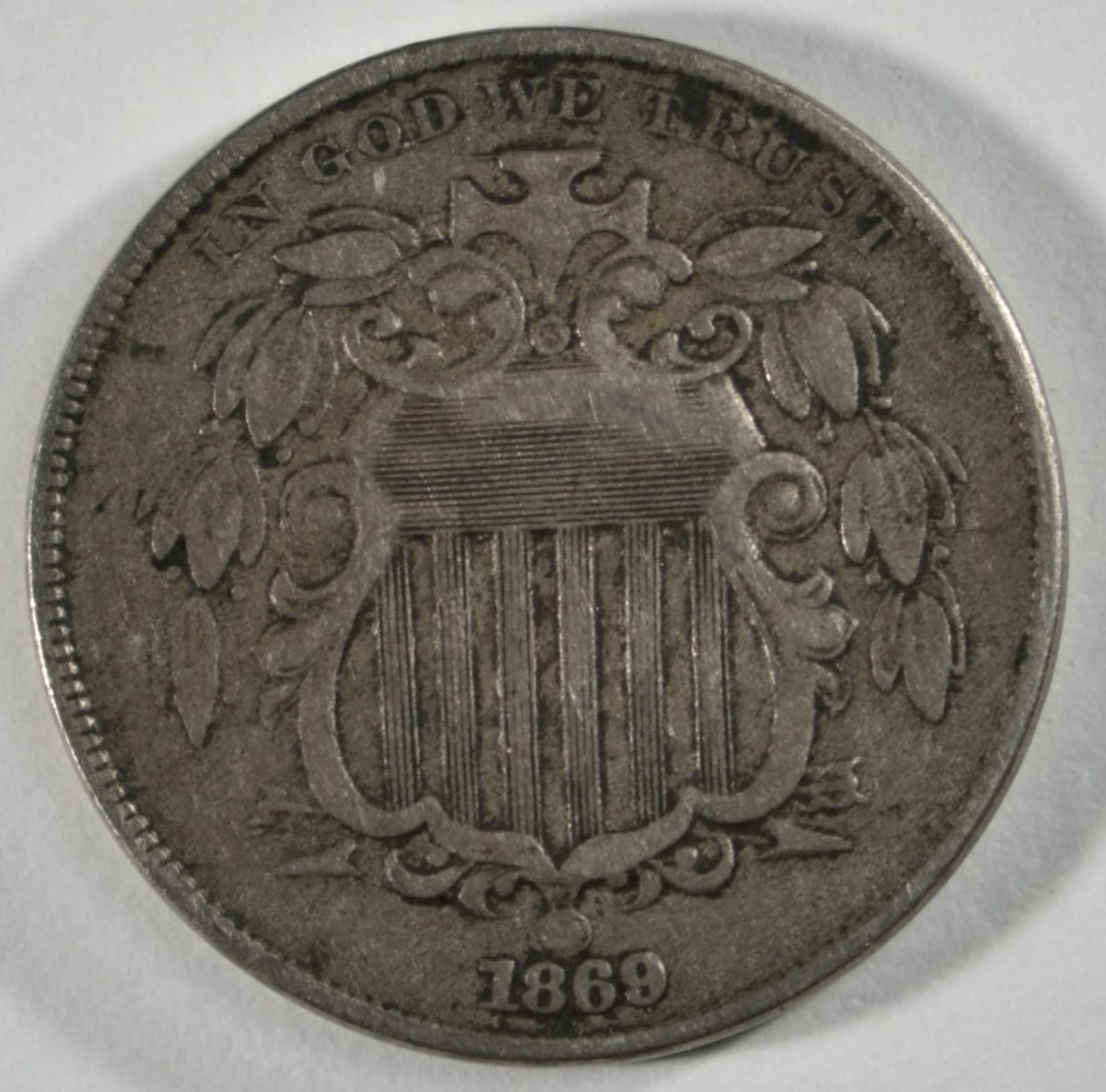 1869 Shield Nickel: Follow us on Facebook, Instagram, X, and TikTok.