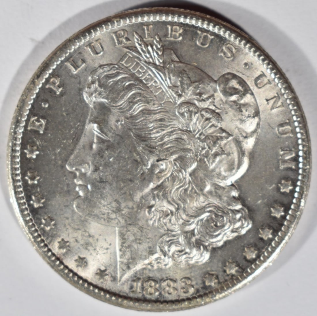 1883-CC Morgan Dollar: Bid online today