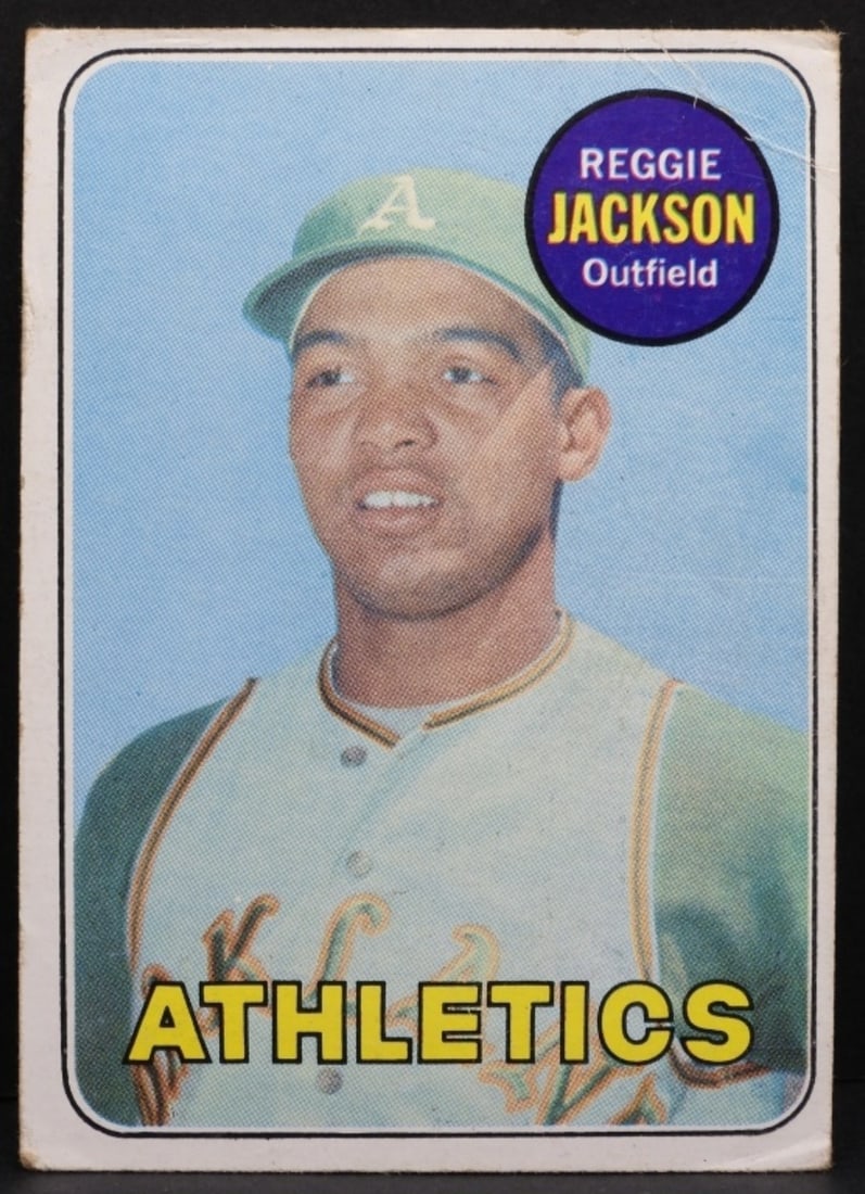 Reggie Jackson TOPPS #260 Card: Creased top right corner, creased bottom right corner. Rounded edges. Good condition
