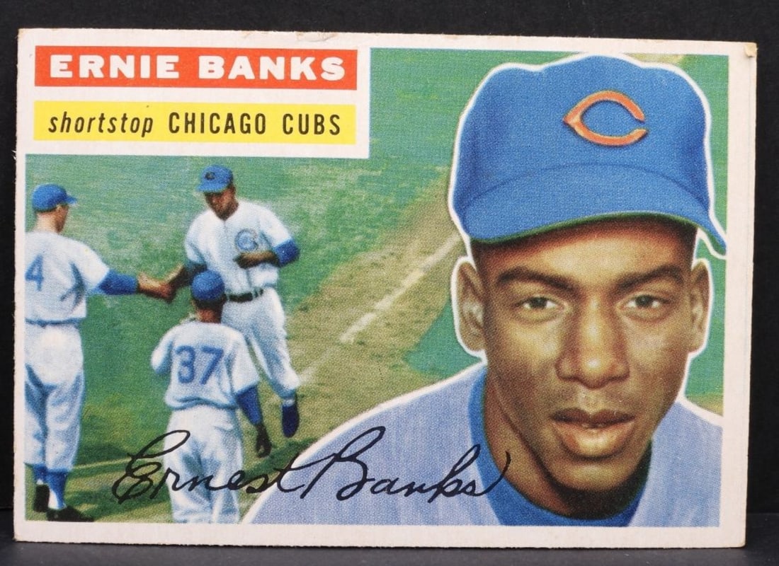 Ernie Banks #15 TOPPS Card: Top of the card is slightly ripped, corners are slightly rounded. No creases. Good condition