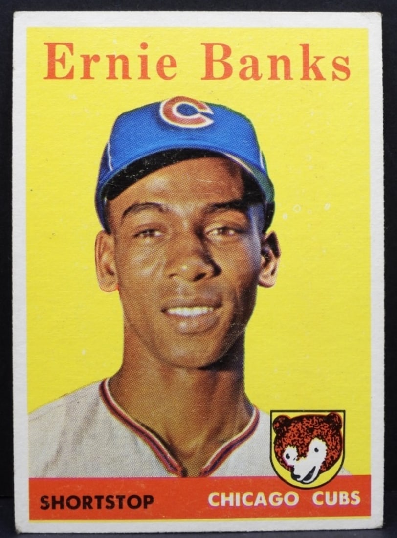 Ernie Banks #310 TOPPS Card: No creases, corners slightly worn down. Good condition