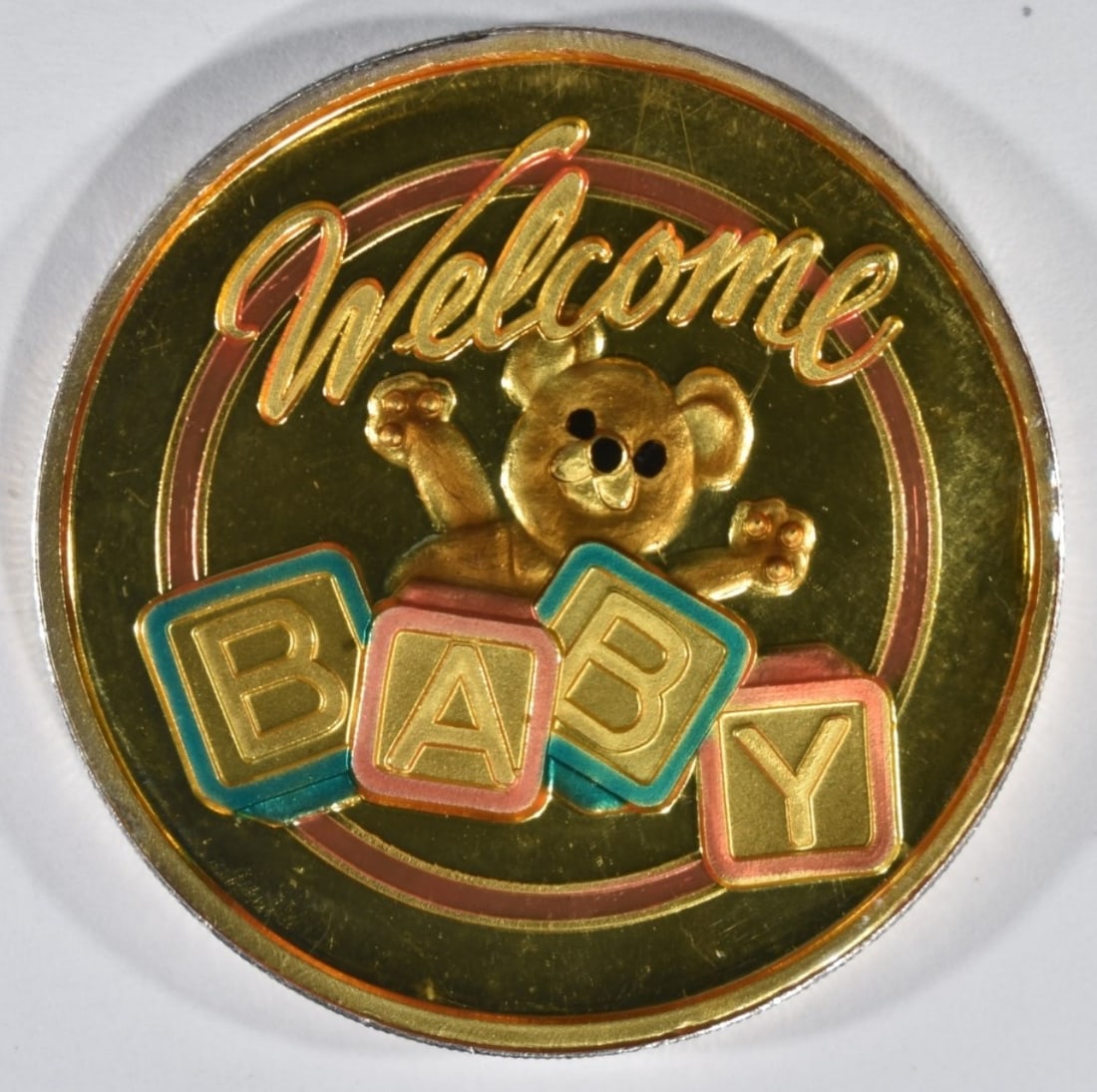 1oz Welcome Baby Silver Round: Follow us on Facebook, Instagram, X, and TikTok.