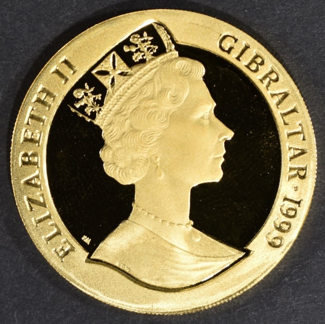 1999 1/2 Crown Gold- Millenium: Follow us on Facebook, Instagram, X, and TikTok.