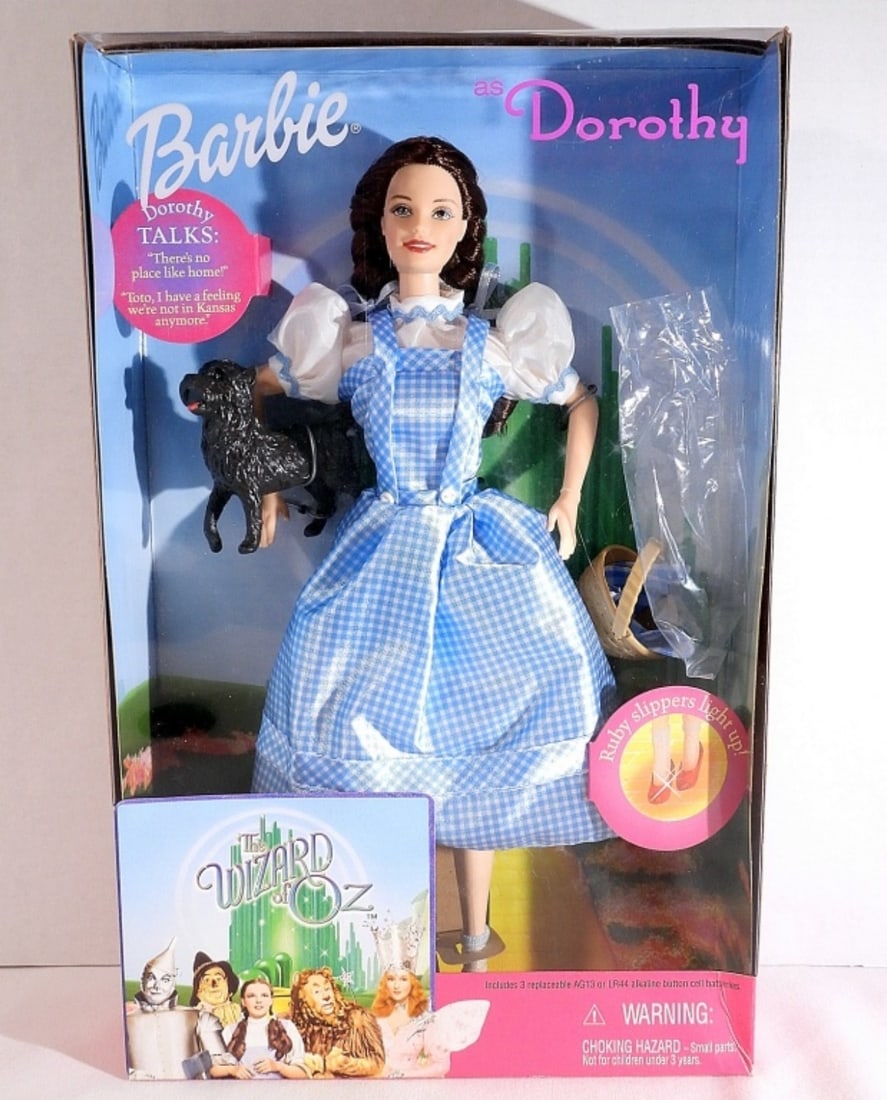 Barbie The Wizard Of Oz Dorothy 1999: Still sealed in its original box. The box has held up nicely. Does have a dent on the bottom corner. Made by Mattel