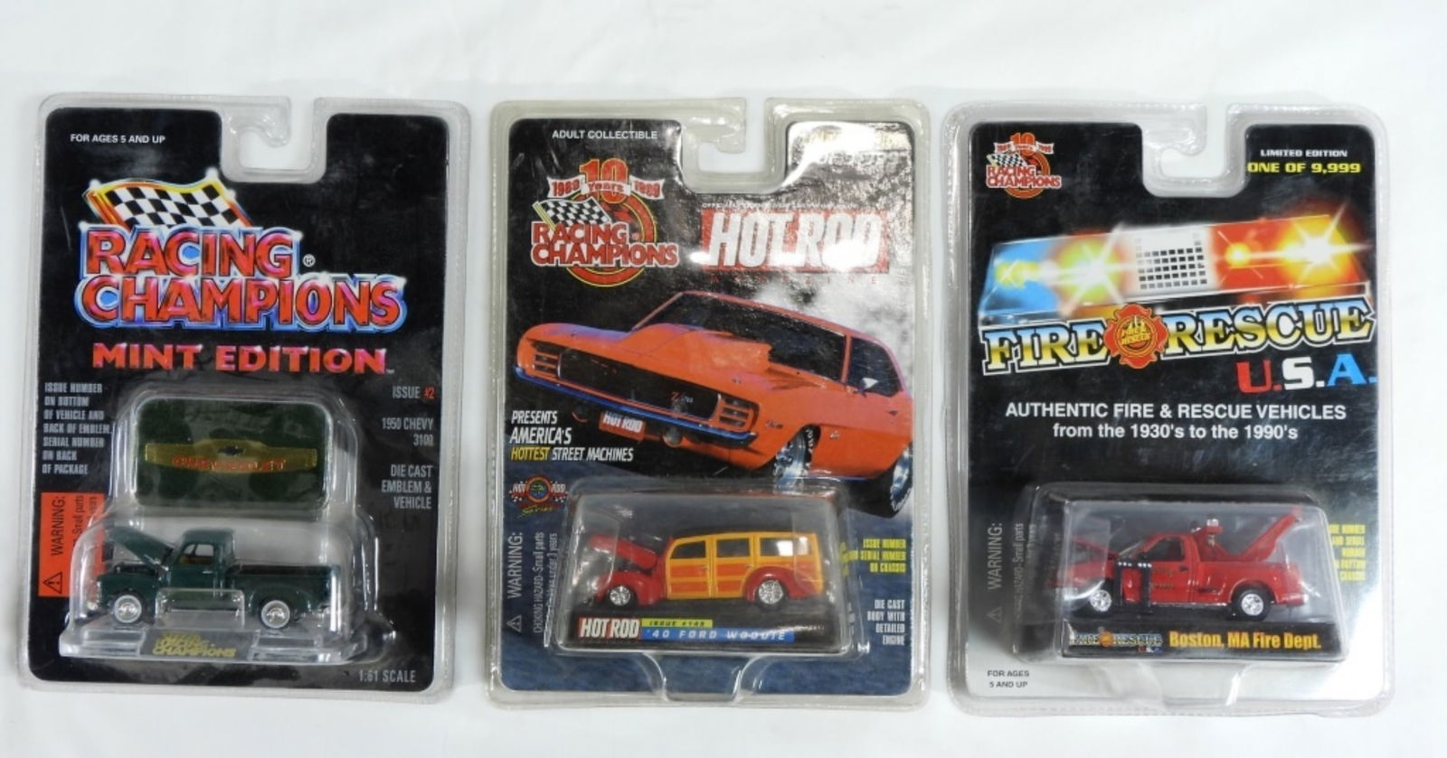 Mixed Lot Of 3 Cars: The 1st car is a Racing Champions Hot Rod Magazines 1940 Ford Woodie, the 2nd car is a Racing Champions Fire Rescue USA Boston, MA â€˜97 Ford F-150 Tow Truck, the 3rd car is a Racing