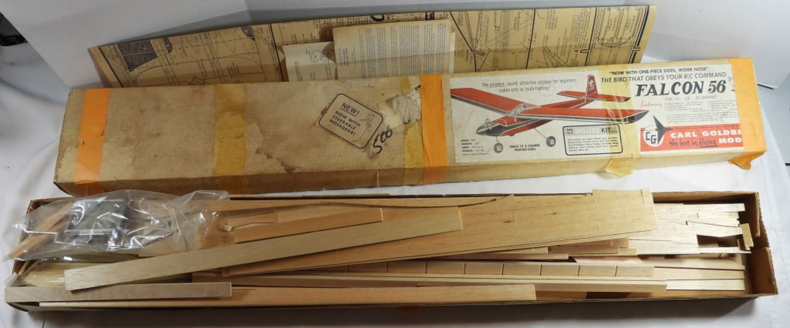 Carl Goldberg "Falcon 56" Deluxe Kit: Comes with its original box. Unclear if it is a complete set.