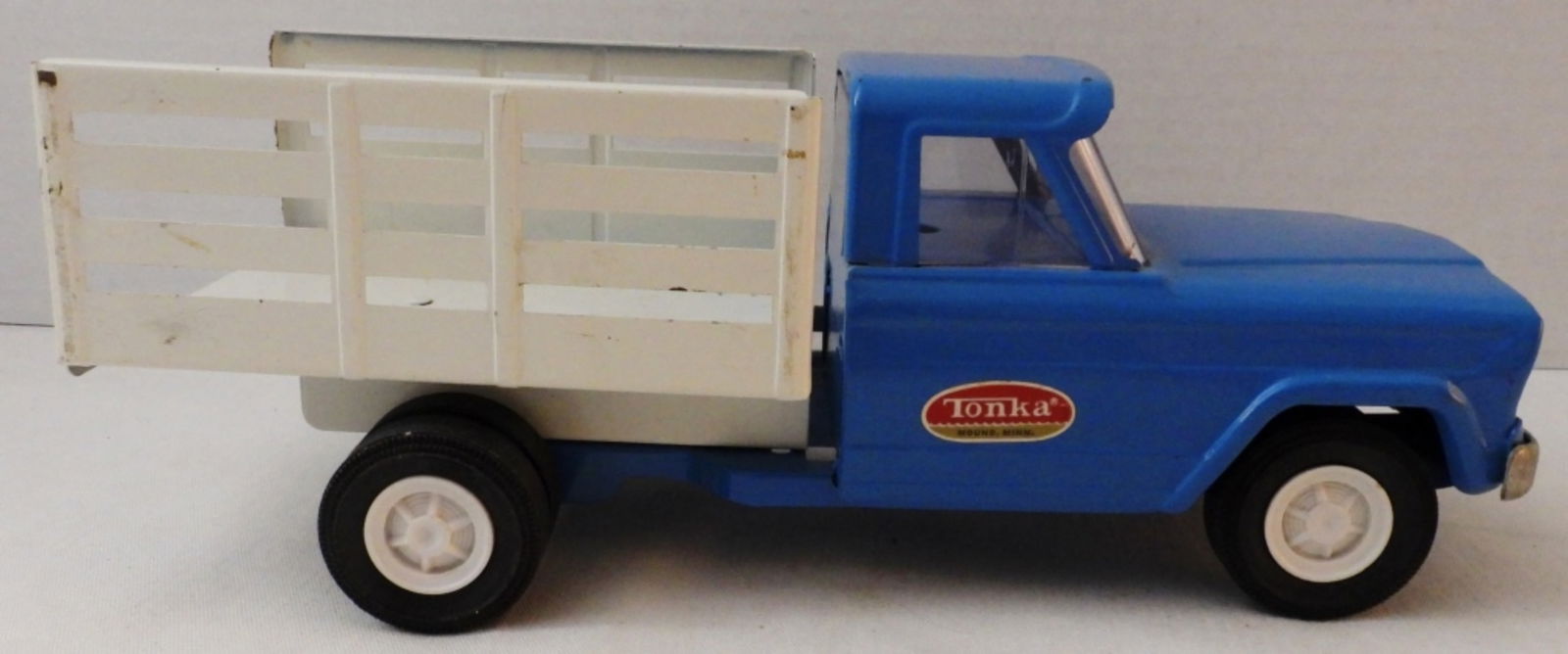 1960s Tonka Truck Farm Truck: Pressed steel, blue and white, great condition, movable wheels, missing two sides of the white bed, 9.5" x 4" x 4"