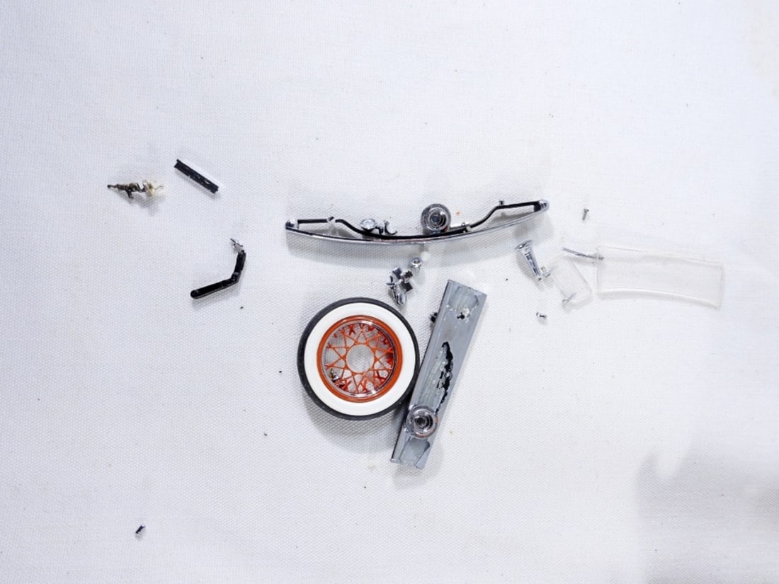 2 Vintage Collectable Cars: A 1962 Chevrolet Confederate Die Cast Car with broken parts (may be repaired), A 1929 Bugatti Royal Die Cast car also has broken parts(may be repairable), and a Mobil Gas Pump Limited Edition