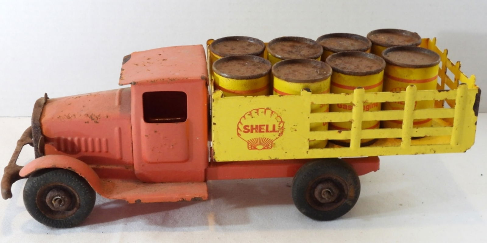Metal Shell Toy Truck: Has barrels with it. Rusted, paint is chipping. In poor condition