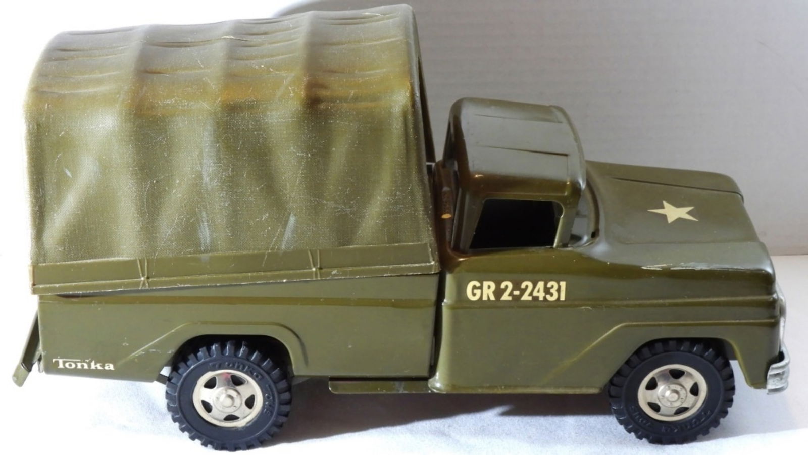 Tonka Metal Army Truck: In good condition, some scuffs on it.