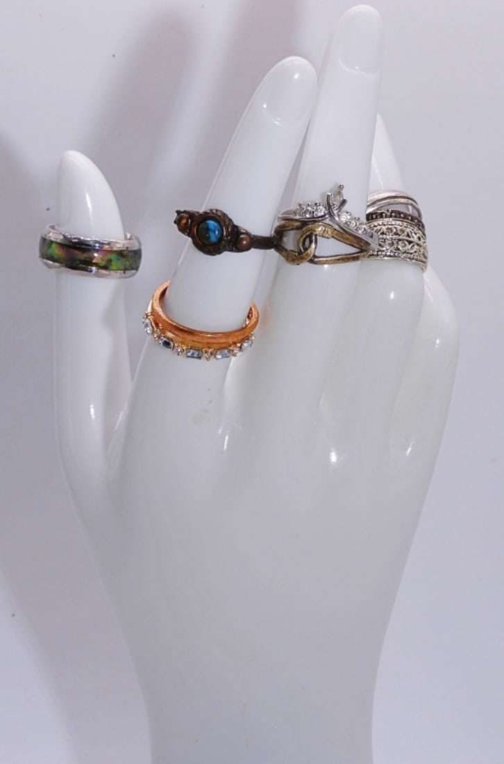 (9) Unique Small Rings: Could be wedding bands or simple bands