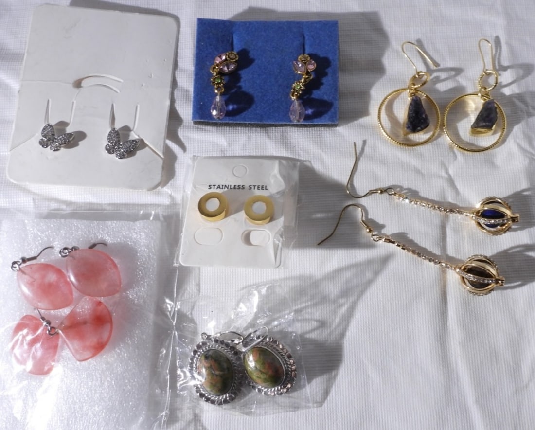 (7) Pairs Of Post Earrings: Visit us on Facebook