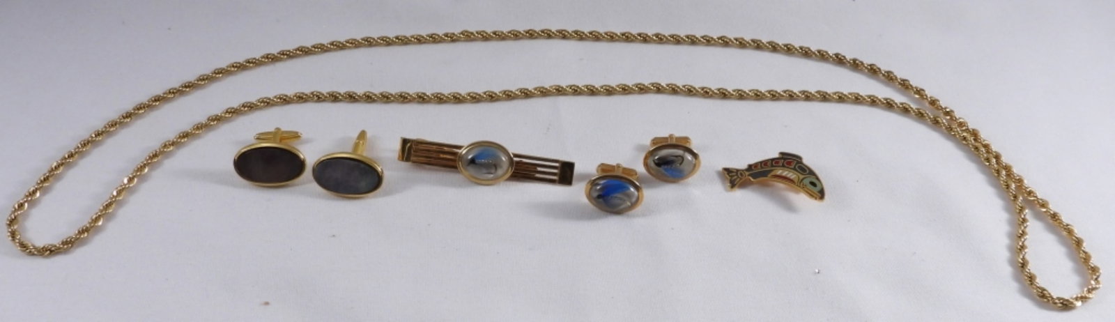 Men's Gold-Tone Lot: 2 pairs of cuff links, a tie clip, a necklace, and a pin.