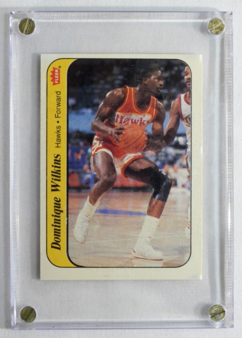 Dominique Wilkins Fleer #11: In a case. In good condition