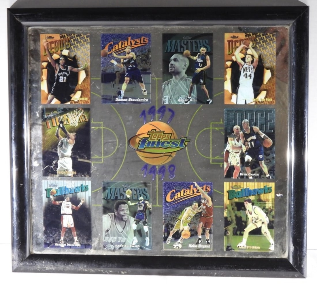 1997 1998 Topps Finest Mirror photo: Tim Duncan, Damon Stoudamire, Grant Hill, Keith Van Horn, Alonzo Mourning, Kevin Garnett, Hakeem Olajuwon, Patrick Ewing, Kobe Bryant, and John Stockton. The Frame has some wear on the bottom.