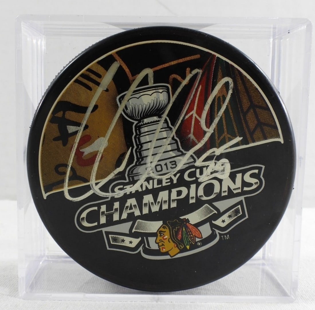Corey Crawford Autographed Puck: In good condition, verification through Schwarts Authentication.