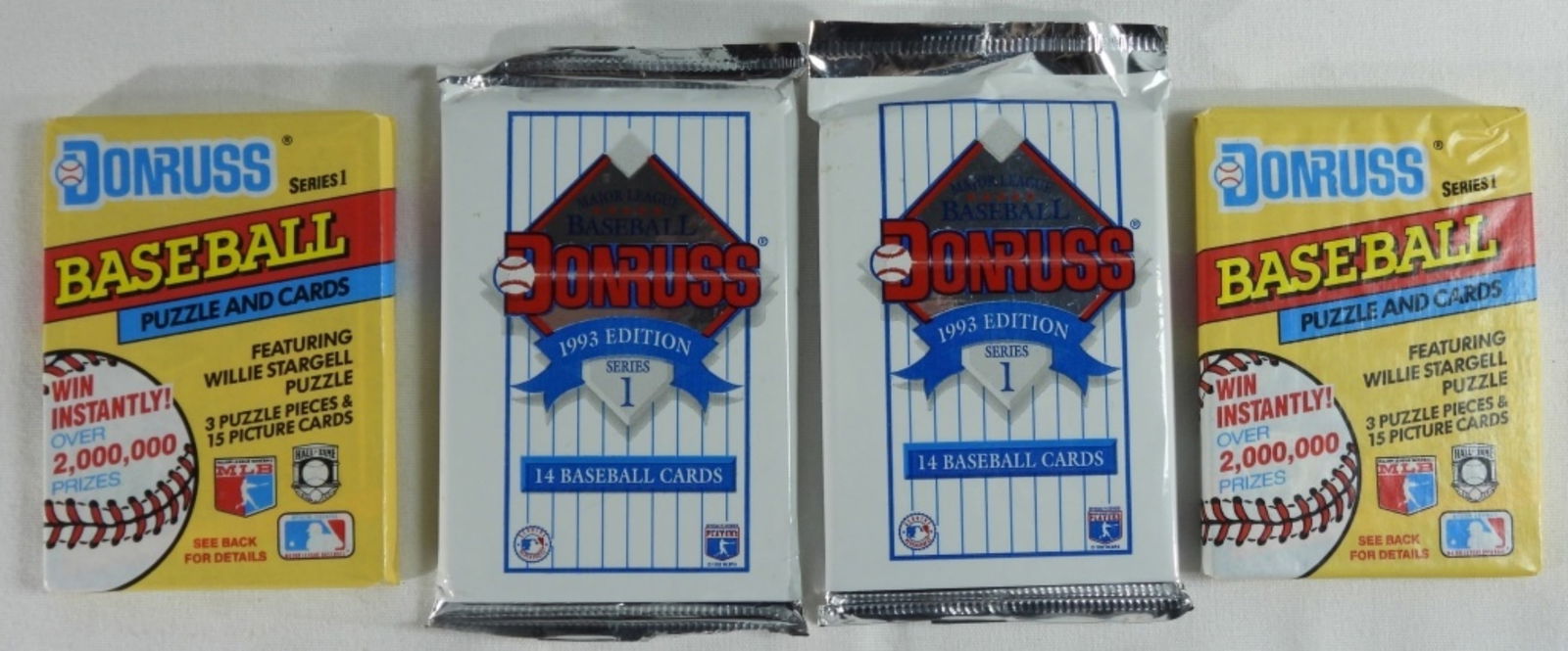 (4) Donruss Baseball Card Collections: 4 unopened donruss packets of baseball cards. All in good condition