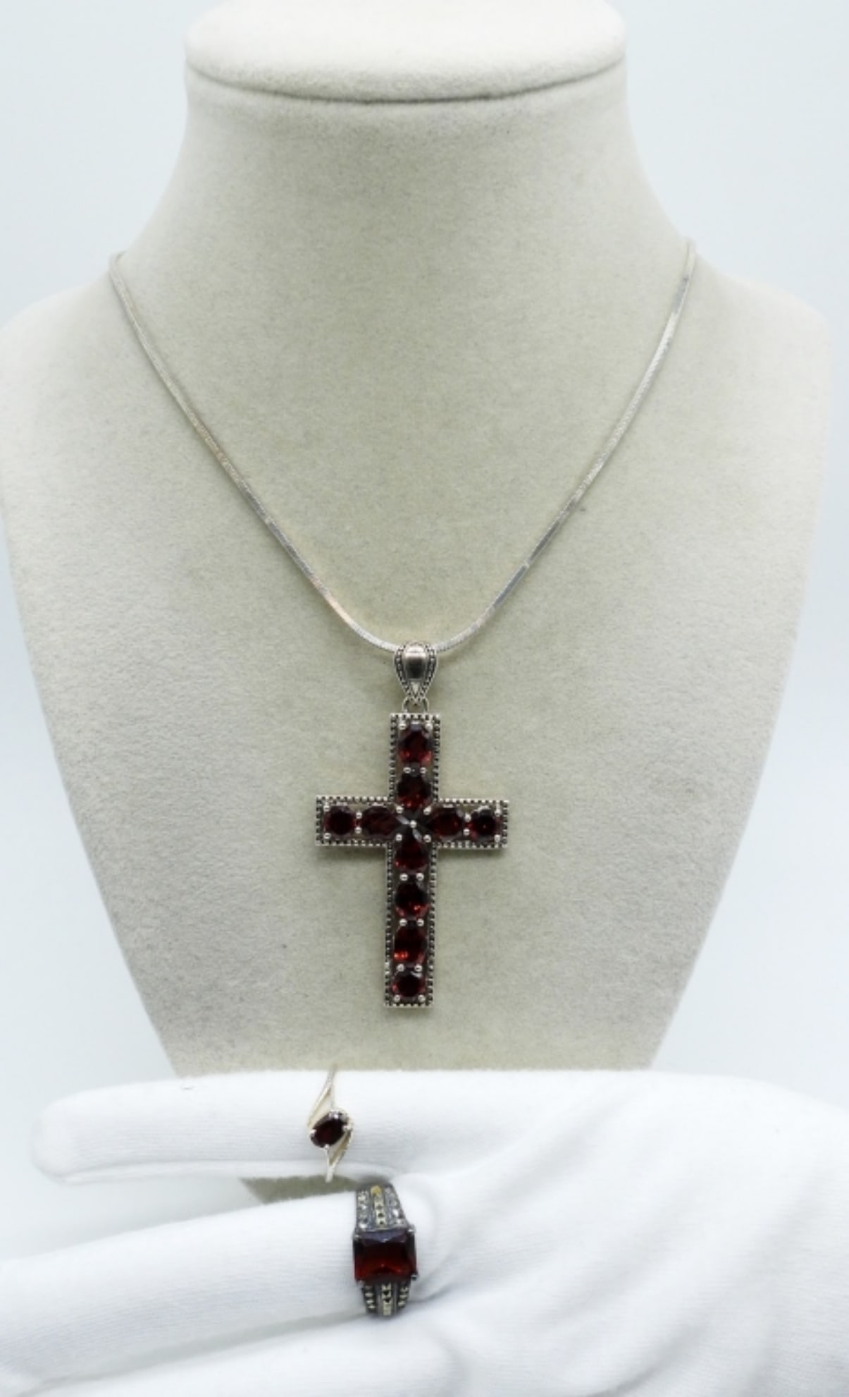 Garnet Cross Pendant & Rings - Sterling: Garnet cross pendant and two rings, all sterling. Pendant is 2.5" long and chain is 18" long. Two sterling rings with garnet gemstones are sizes 7 & 7.5 (14.5 dwt)