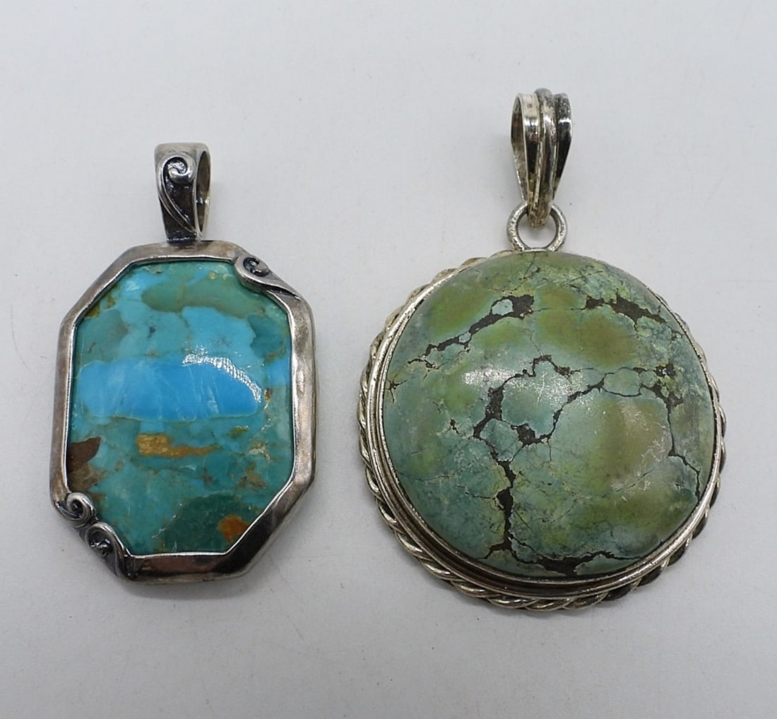2 Sterling Turquoise Gemstone Pendants: Two sterling pendants with large turquoise gemstones. Both 2" long. (12 dwt)