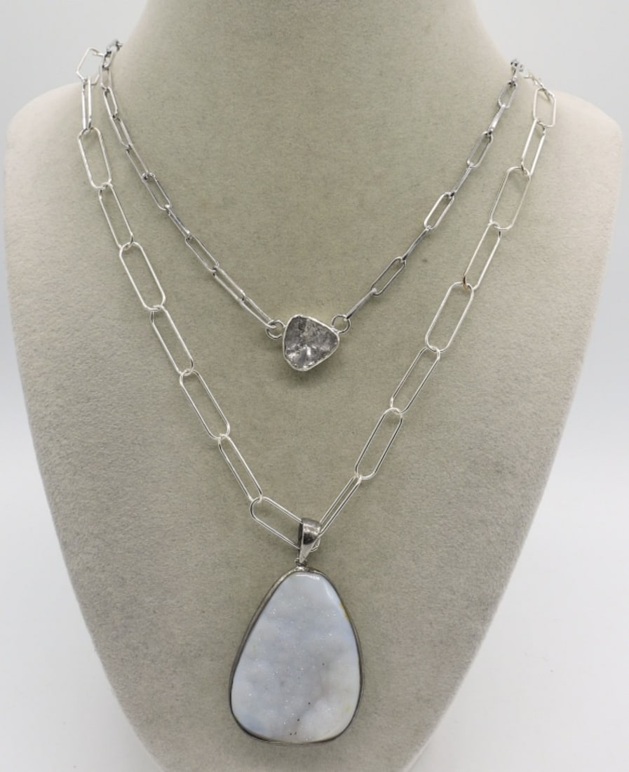 White Druzy & Quartz 925 Necklaces: White Druzy pendant, 2" long, on a 22" sterling chain. Quartz gemstone necklace, 18" long. (16 dwt)