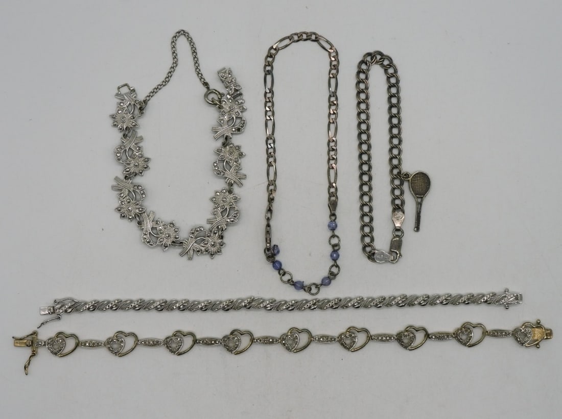 5 Petite Sterling Fashion Bracelets: Five petite sterling fashion bracelets, 6-8". (32 dwt)