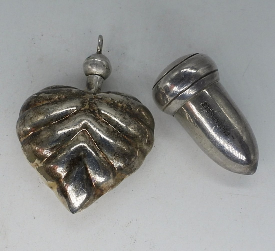 Vintage Perfume Pendant & Cigarette Holder: Telescopic, collapsable, portable vintage sterling cigarette holder. Telescopes to 2.5" long. Heart shaped sterling perfume pendant, 1.5" long. (10 dwt)