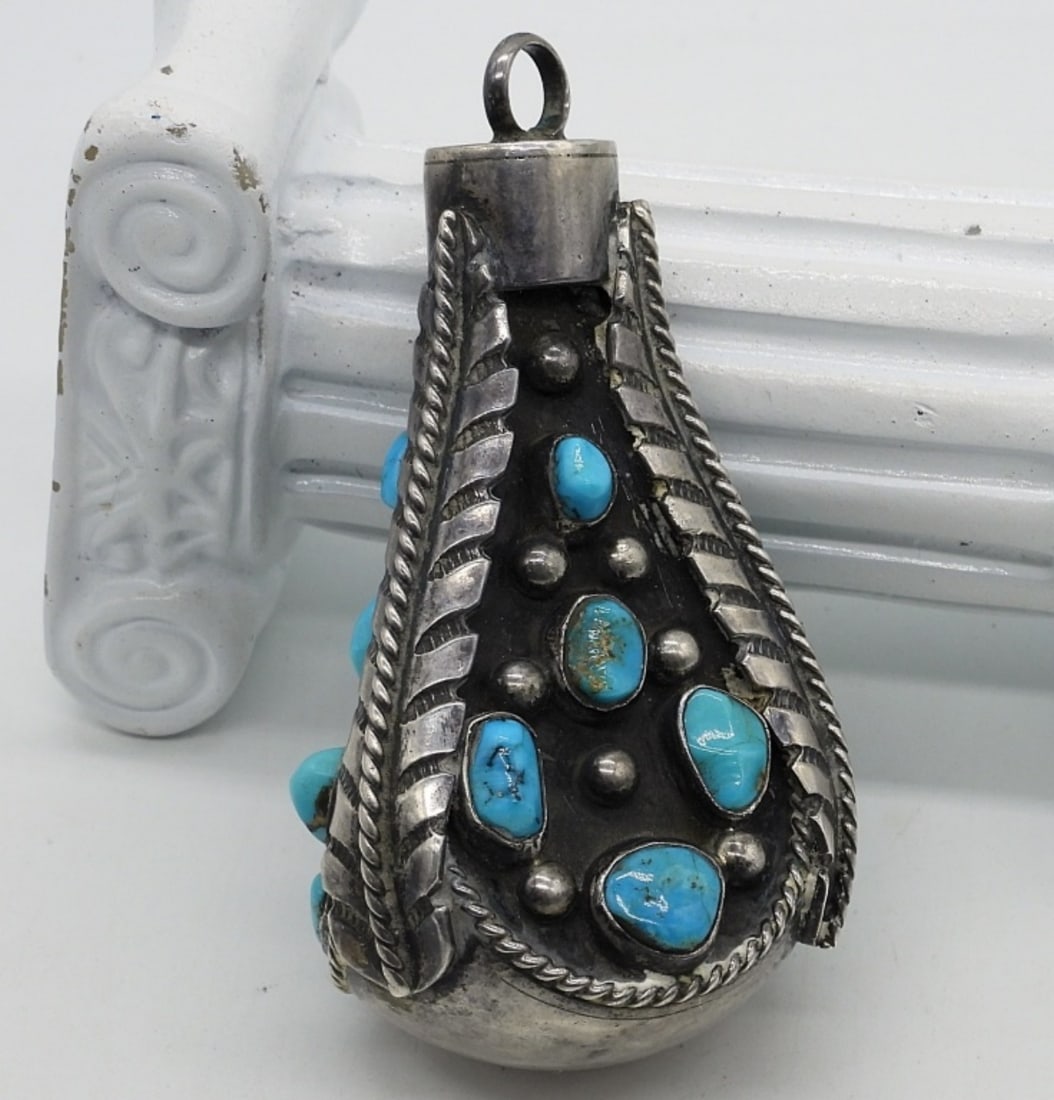 J. Abeyta Native American 925 Pendant: J. Abeyta W/H sterling and turquoise pendant. Very large and very heavy! 2 3/4" tall. Very unique piece of art. (55 dwt)