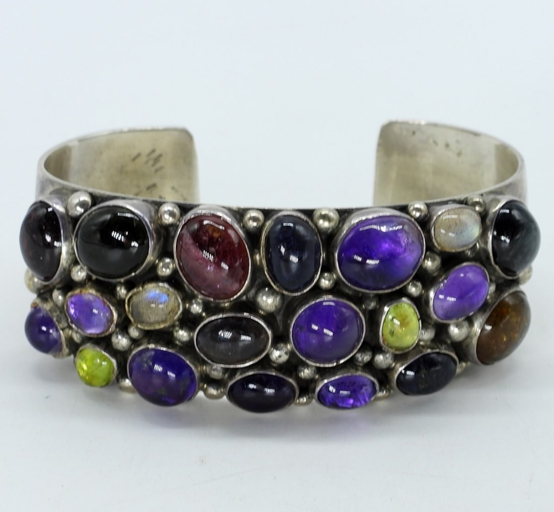 Emer Thompson 925 Navajo Bangle Bracelet: Emer Thompson sterling Navajo cuff bracelet with gemstones. Marked Emer Thompson Sterling. Heavy Piece! (34.7 dwt)