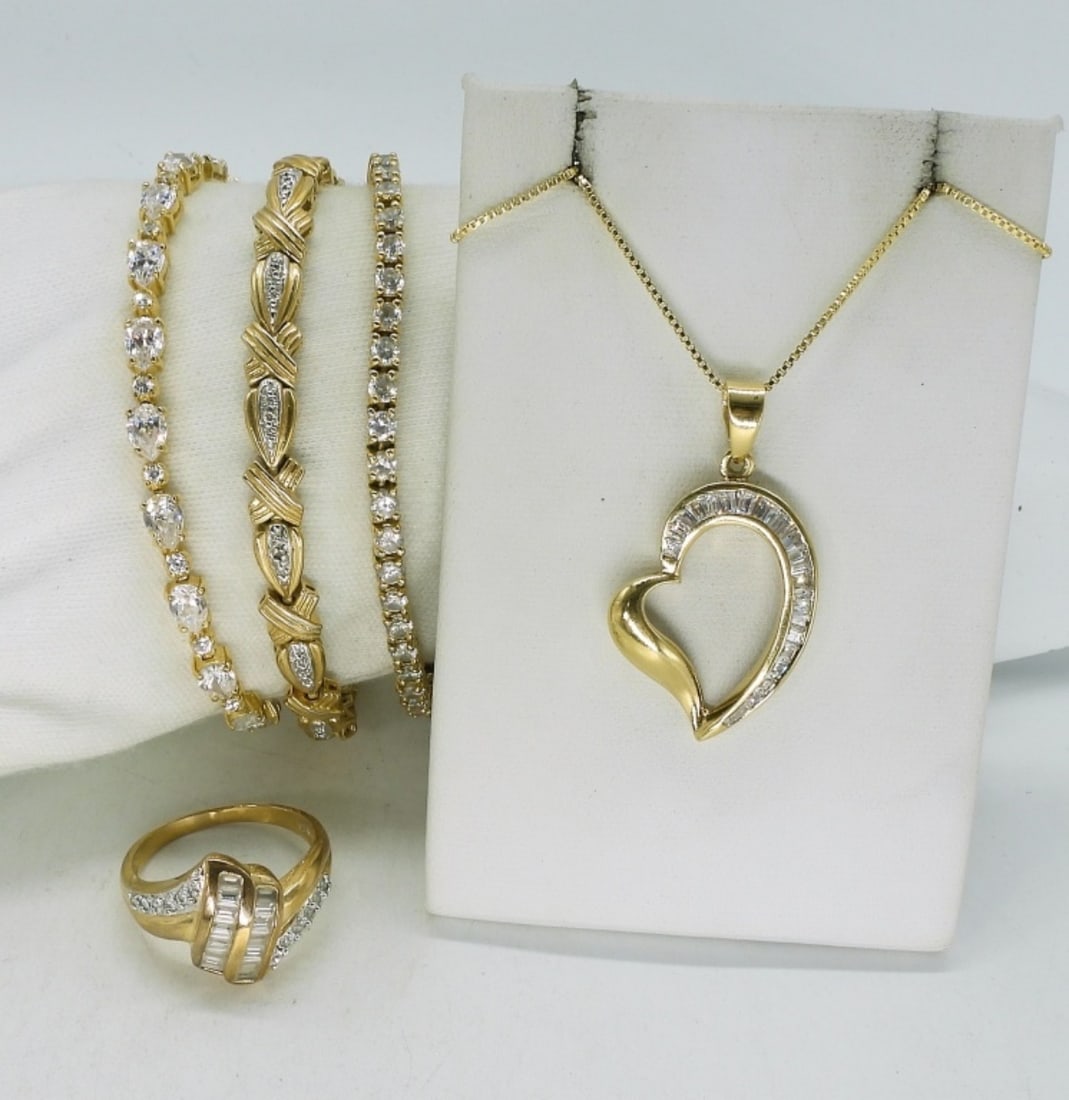 Gold Tone 925 Bridal Style Bracelets +: Gold tone sterling. Three bracelets, 7". Heart necklace, 18". Ring size 10. Princess cut bracelet, clasp is broken. safety clasps do hold it together though. (31.5 dwt) (6x4x2)