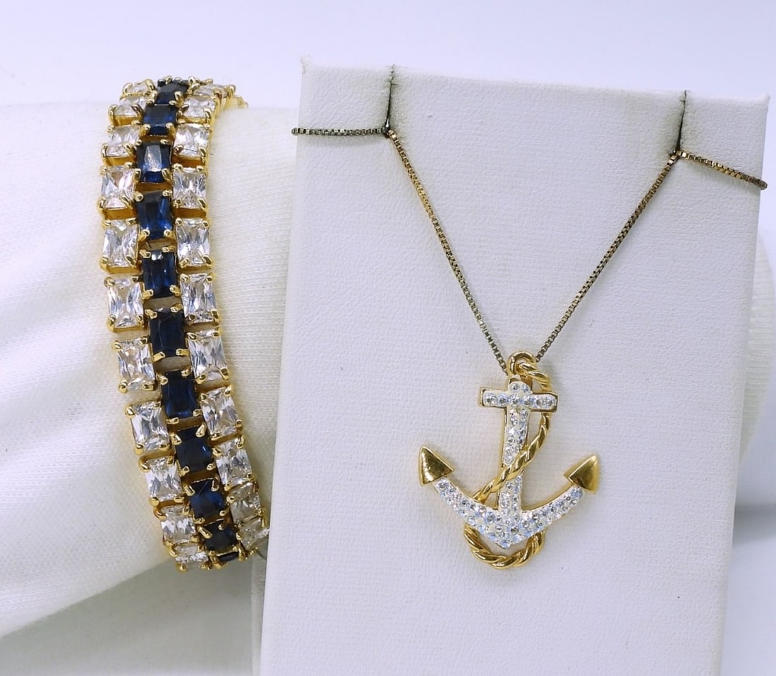 Gold Tone 925 Nautical Necklace & Bracelet: Gold tone sterling anchor necklace, 18". Gold tone 925 blue and white gemstones, 7". (26.4 dwt)