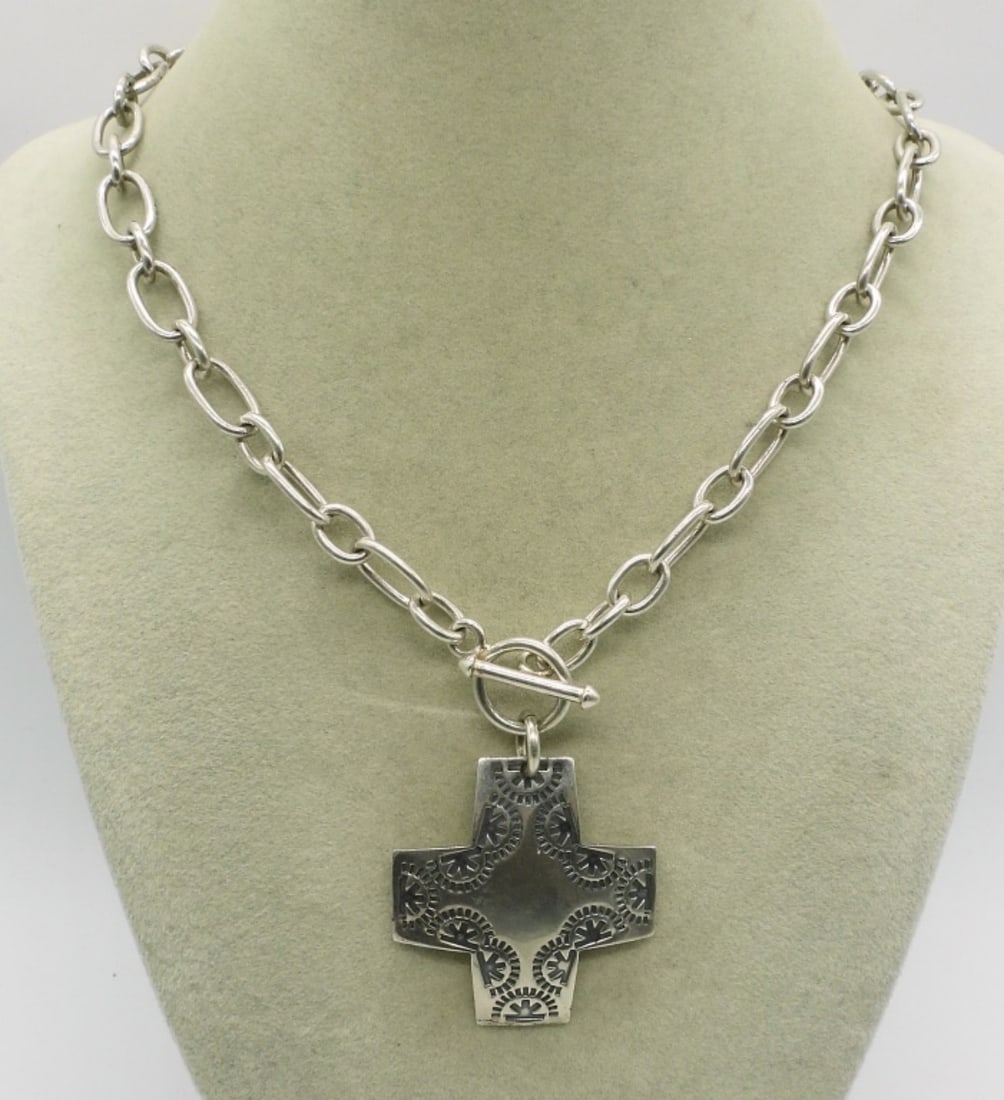 Silpada Virtuosity Sterling Cross Necklace: Silpada Virtuosity sterling silver cross necklace, with toggle clasp. 16" long. (25.1 dwt)