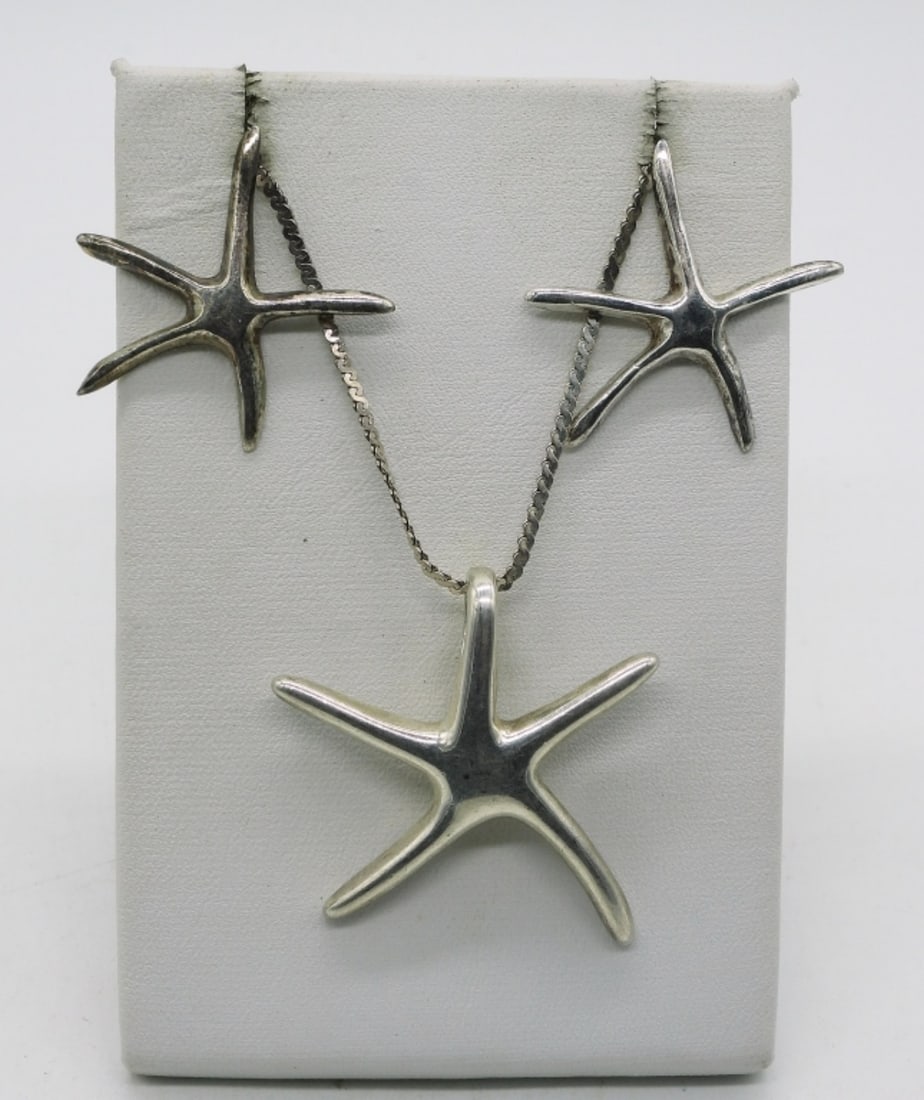 Starfish Sterling Necklace Earring Set: Sterling starfish pendant on a 36" necklace. Matching pierced earrings. (9.3 dwt) (6x4x2)