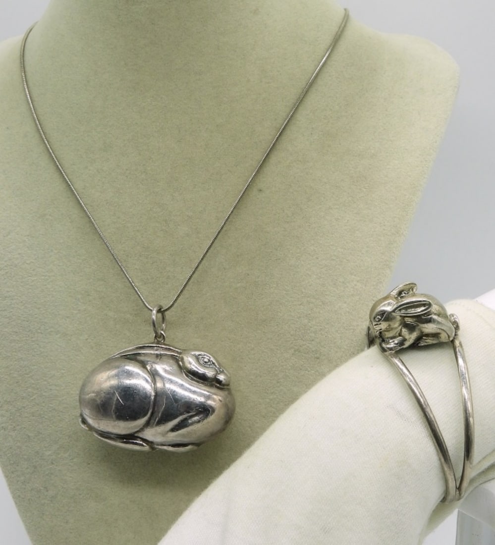 Sterling Rabbit Cuff Bracelet & Necklace: Sterling cuff bracelet (Mexico 925) with rabbit. Puffed sterling rabbit pendant, 2", on a 16" sterling chain. (24 dwt)